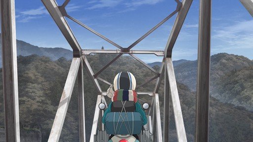 Riding on a red iron bridge
